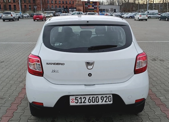 Dacia Sandero cena 23900 przebieg: 140512, rok produkcji 2014 z Ślesin małe 137
